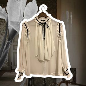 White blouse with neck tie